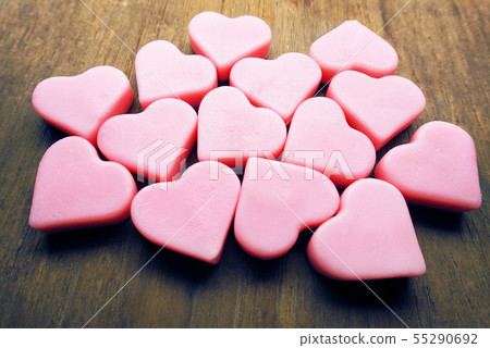 Vintage pink hearts grouping on wood table, love Vintage pink hearts grouping on wood table, love 55290692