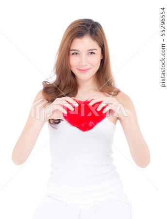 Beautiful asian young woman holding heart shape 55296554