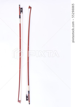 Two fiddle sticks over white background. Two fiddle sticks over white background. 55298865