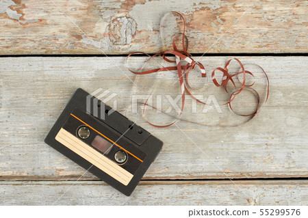 Old black audio cassette tape. Old black audio cassette tape. 55299576