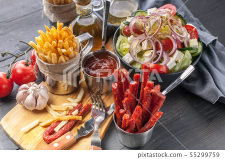 Homemade French Fries and Greek Salad Homemade French Fries and Greek Salad 55299759