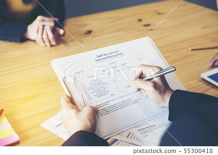 Job applicants having an interview with Human Job applicants having an interview with Human 55300418