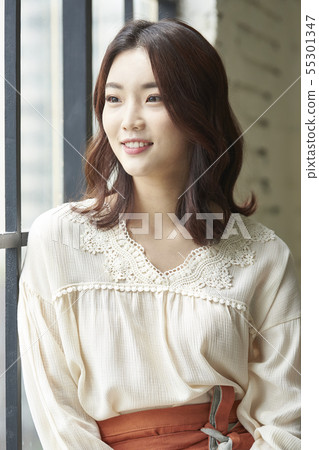 Female cafe clerk Female cafe clerk 55301347