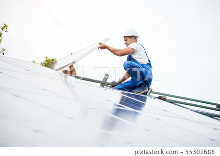 Installing of solar photo voltaic panel system Installing of solar photo voltaic panel system 55301688