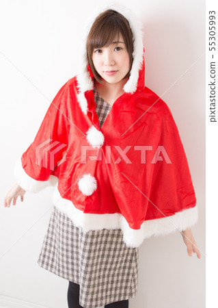 Woman who has got a santa cape Woman who has got a santa cape 55305993