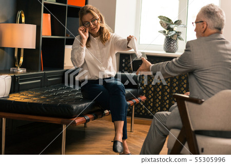 Married woman in eyeglasses complaining about her problems 55305996