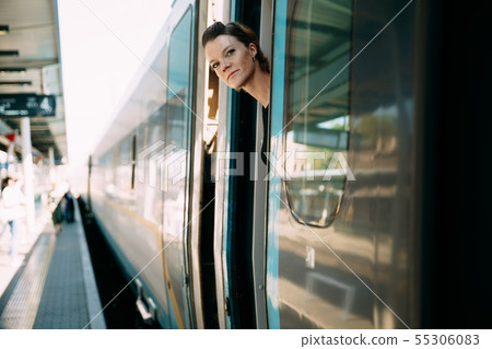 businessman with luggage traveling by speed train businessman with luggage traveling by speed train 55306083