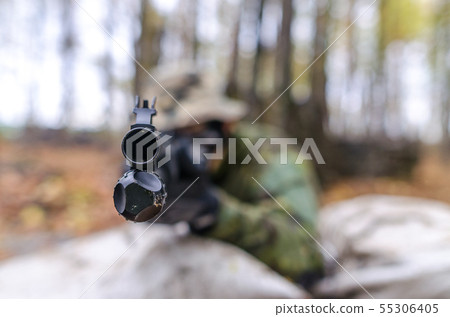 Army soldier in forest Army soldier in forest 55306405