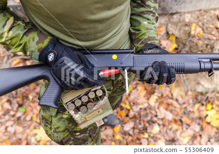 Army soldier in forest 55306409