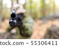 Army soldier in forest 55306411