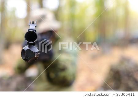 Army soldier in forest Army soldier in forest 55306411