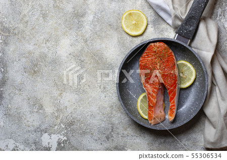 Fresh salmon steak with spices Fresh salmon steak with spices 55306534