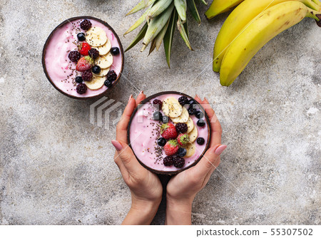 Acai bowl in coconut plate. Acai bowl in coconut plate. 55307502