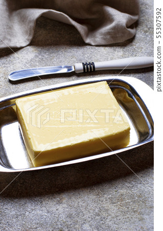Fresh butter and knife in butter-dish Fresh butter and knife in butter-dish 55307592