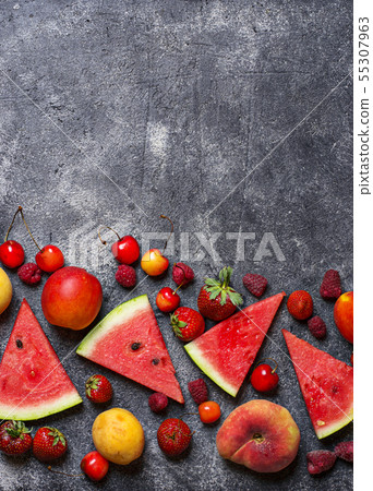Different summer fruits and berries 55307963