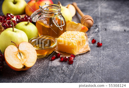 Honey, apple and pomegranate for Rosh Hashana 55308124