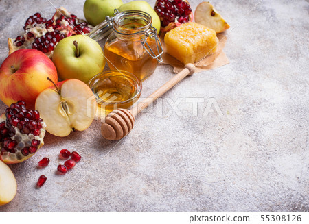 Honey, apple and pomegranate for Rosh Hashana 55308126