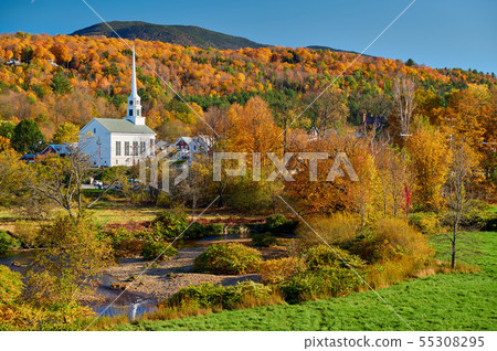 Iconic New England church in Stowe town at autumn 55308295