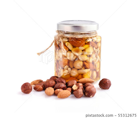 Healthy mix of natural honey with different nuts Healthy mix of natural honey with different nuts 55312675