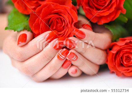 Woman beautiful hands with red manicure 55312734