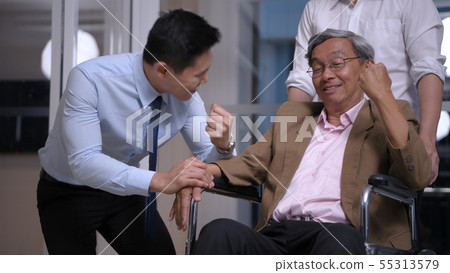 Health concept. Young men encourage old people in 55313579