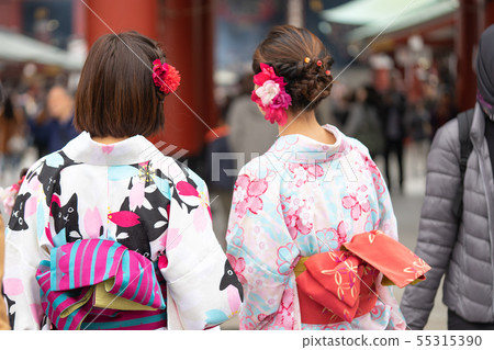 Young girl wearing Japanese kimono standing in Young girl wearing Japanese kimono standing in 55315390