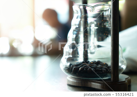 Coffee beans with glass for decorate at coffee Coffee beans with glass for decorate at coffee 55316421