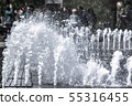 Spray fountain in the wind 55316455