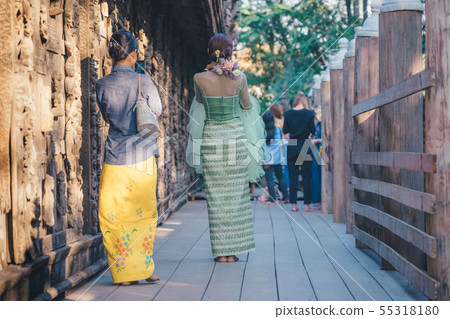 Female tourist take a photo at Shwe Nan Daw Kyaung 55318180