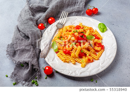 Pasta with shrimp in tomato sauce. Pasta with shrimp in tomato sauce. 55318940