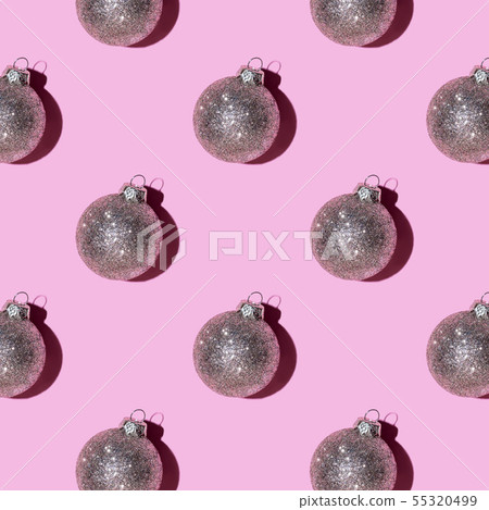 Pattern made of silver balls on pink background. 55320499