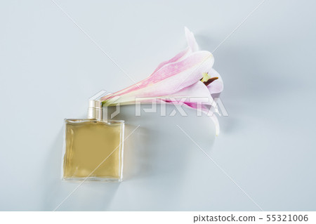 Luxury bottle of perfume with fresh lily flowers 55321006