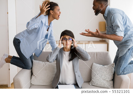 Shocked Marriage Counselor Watching Her Afro Patients Quarrelling In Office 55321101