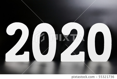 year 2020 made from wooden white numbers on a year 2020 made from wooden white numbers on a 55321736