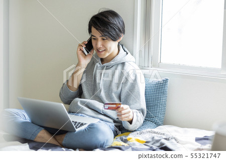Young man credit card Young man credit card 55321747