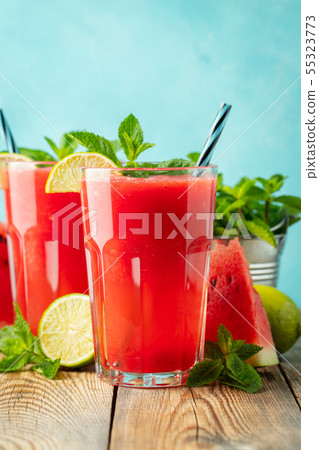 Watermelon slushie with lime and mint. 55323773