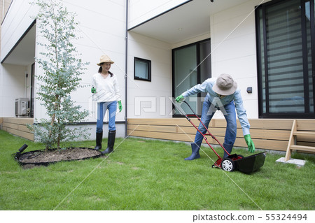 Lawn mower garden work couple 55324494