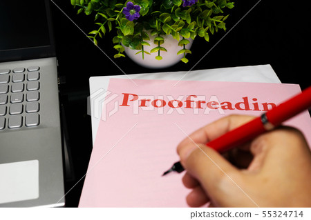 proofreading sheet on table 55324714