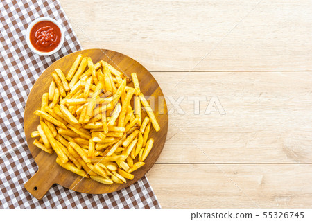 French fries with tomato or ketchup sauce French fries with tomato or ketchup sauce 55326745