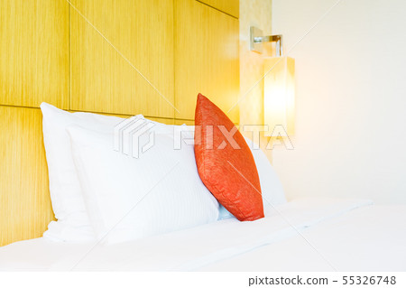 White comfortable pillow on bed decoration White comfortable pillow on bed decoration 55326748