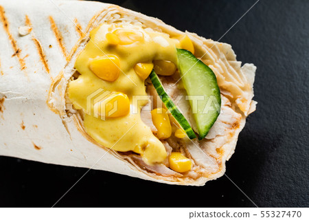 fajita wrap sandwich on the black background 55327470
