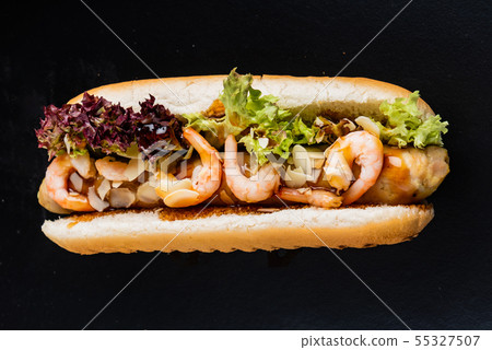 hot dog on the black background 55327507