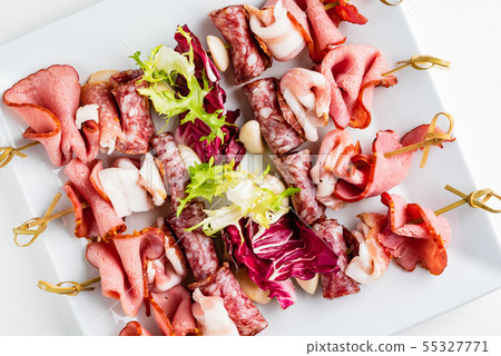 meat appetizers on the white plate meat appetizers on the white plate 55327771