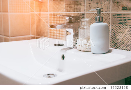 Interior of bathroom with sink basin faucet and Interior of bathroom with sink basin faucet and 55328138