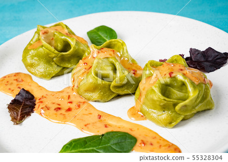Manti is a type of dumpling popular in most Turkic cuisines, 55328304