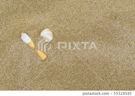 cigarette on the sand beach 55328585