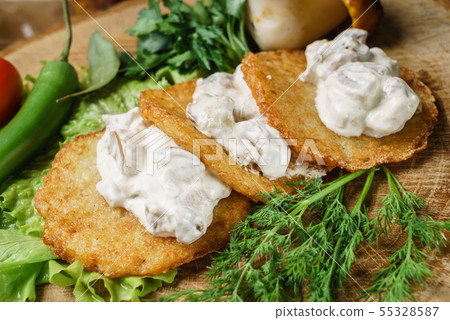 potato pancakes with sauce potato pancakes with sauce 55328587