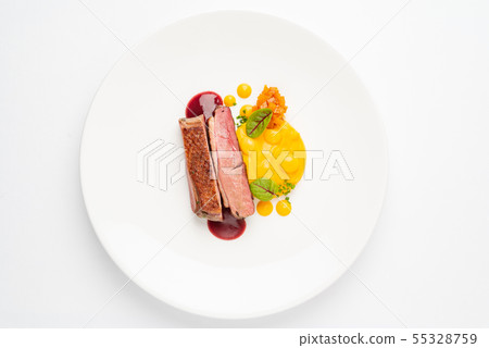 duck with sweet potato puree 55328759