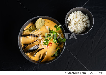 seafood soup and rice on the black background seafood soup and rice on the black background 55328793