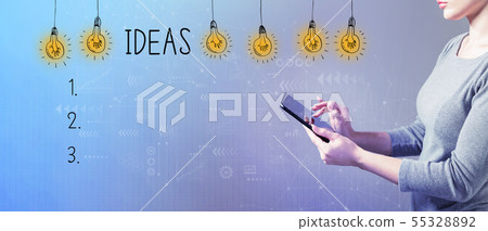 Idea list with woman using a tablet Idea list with woman using a tablet 55328892